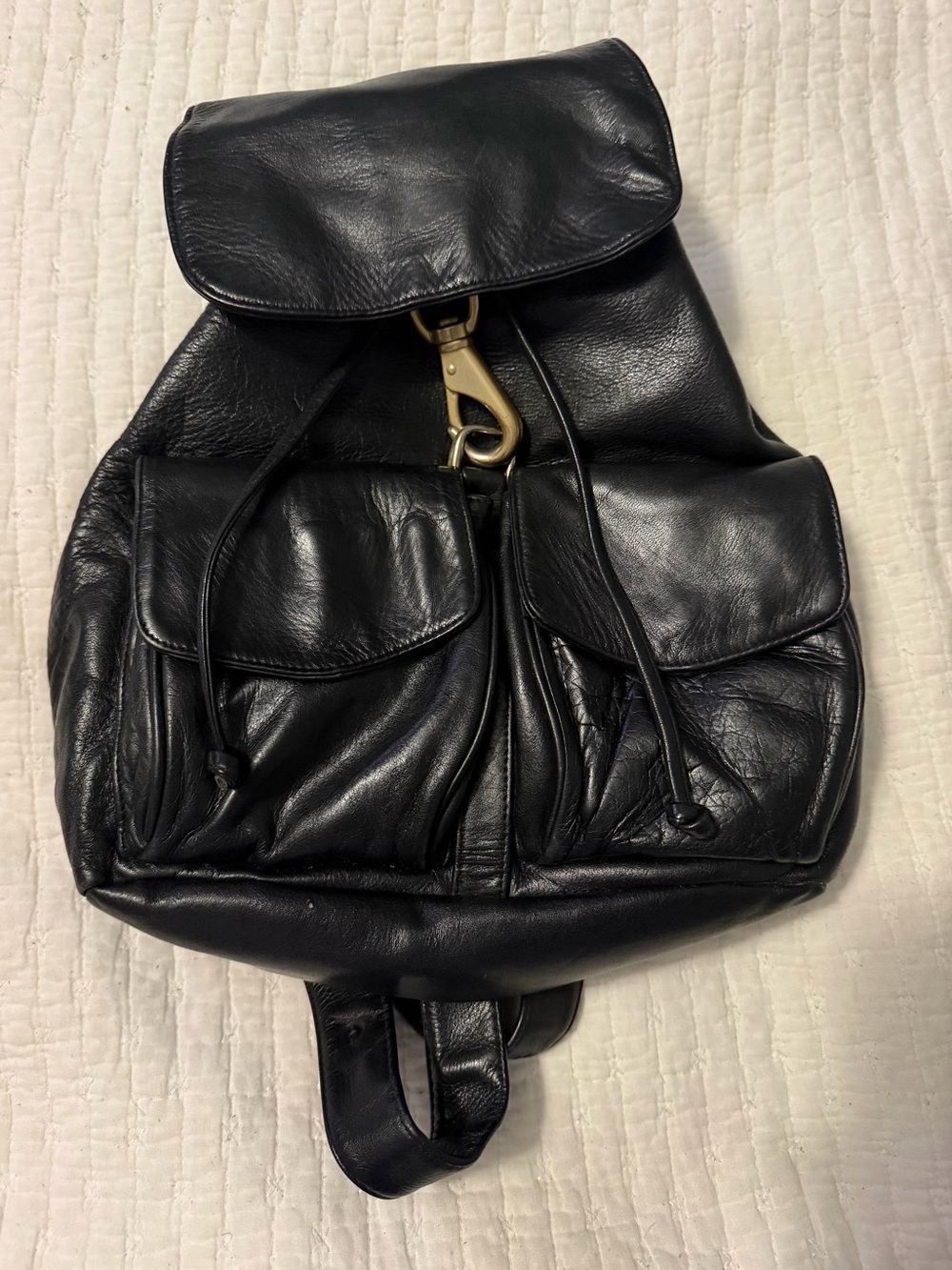 Perlina New York Black Leather Drawstring Backpack with Front Pockets